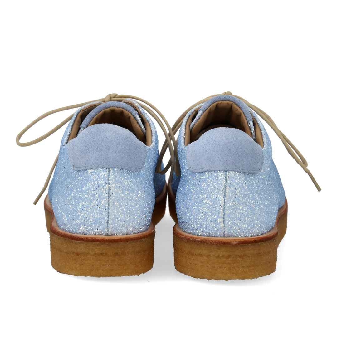 Sneaker mit Glitzer auf Plateausohle