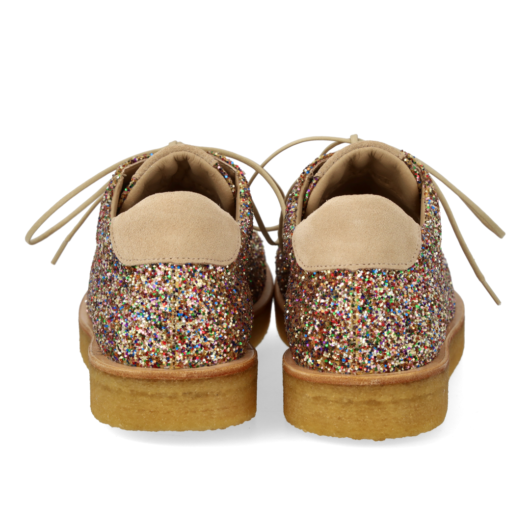 Sneaker mit Glitzer auf Plateausohle